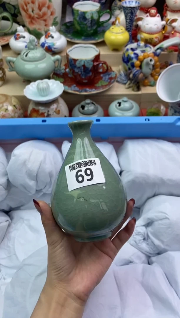 瓷片京****愁隆莲瓷器欢迎大家