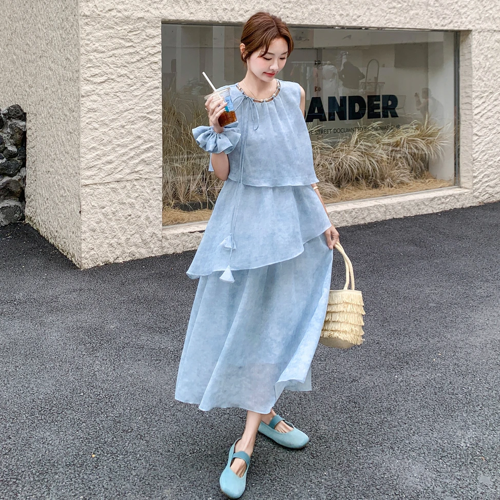 蓝色荷叶边拼接无袖连衣裙2025新款女夏浪漫气质度假风蛋糕背心裙