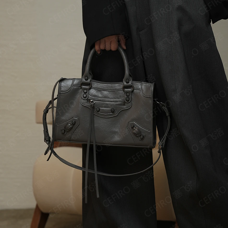 【塞飞洛】羊皮铆钉机车包时尚单肩大容量斜跨包 1093