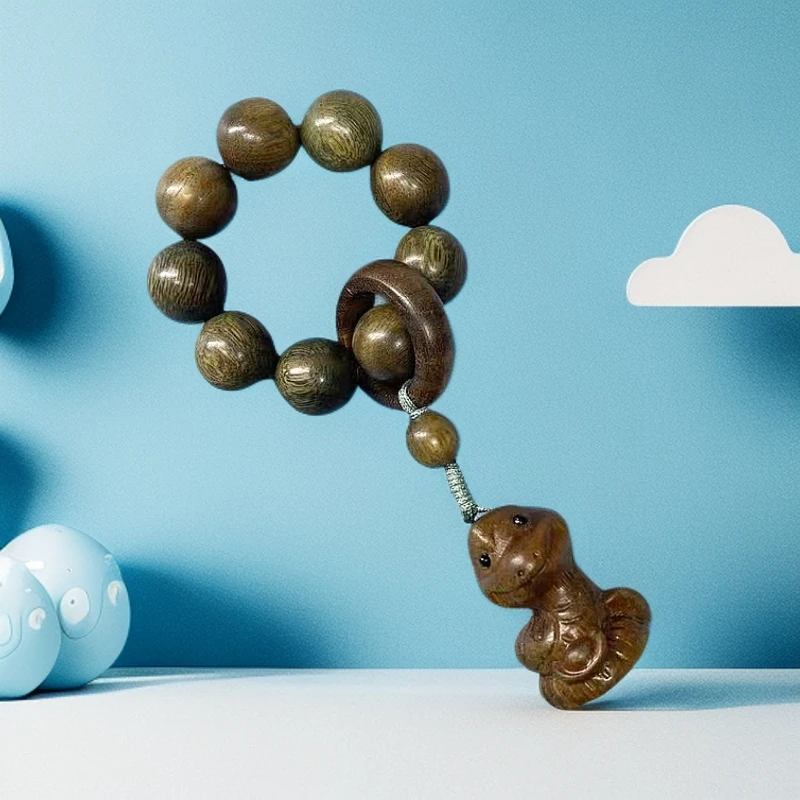 元宝蛇 绿檀木1.2cm 手把件 盘玩件