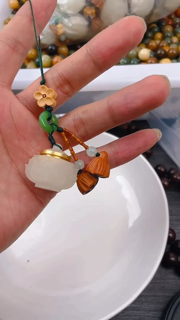 【闪购商品】粉压象牙果吊坠夜光香炉手机链