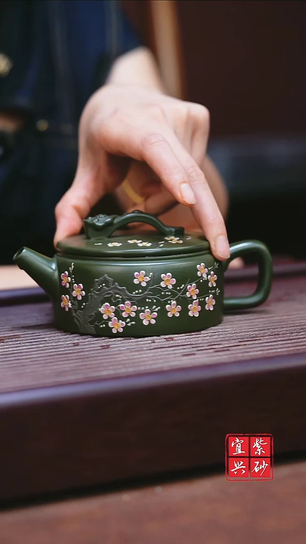 紫砂其他如意梅花汉瓦壶