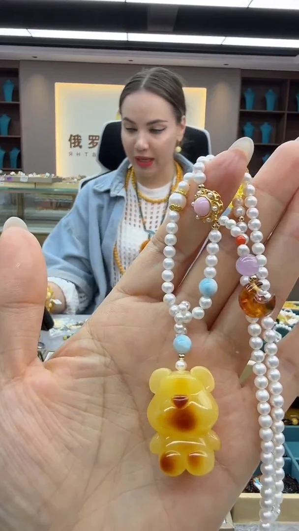 琥珀颈饰未镶嵌149秒拍号 假一罚三