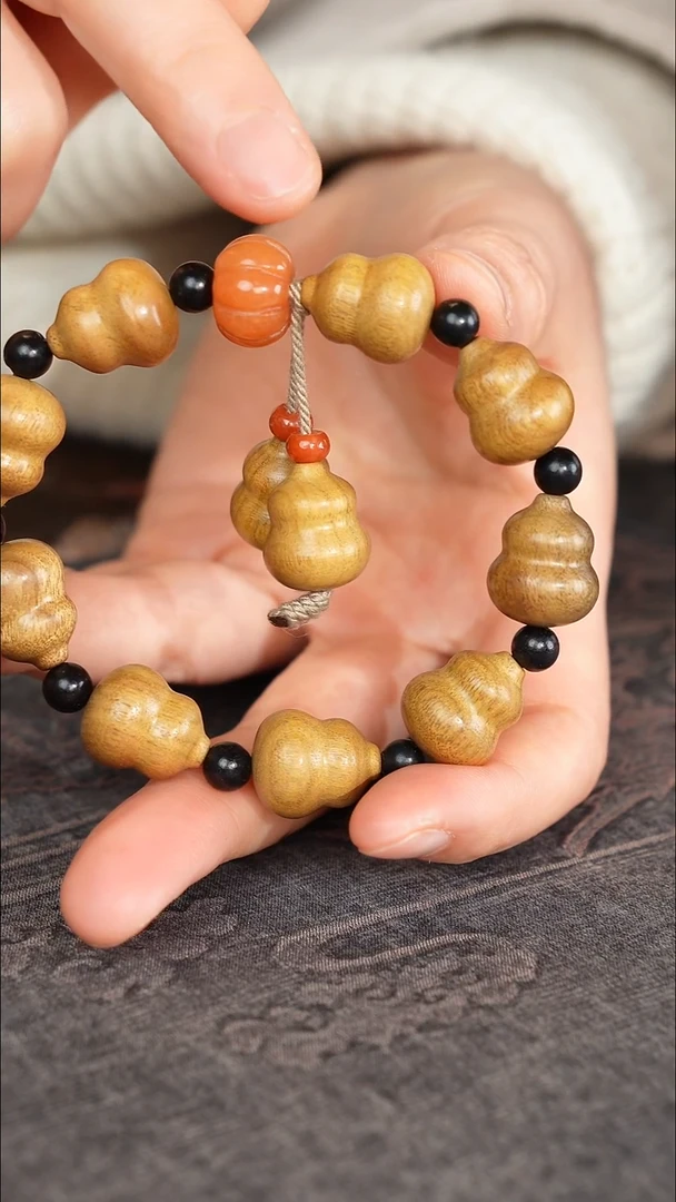 乌木类家具金丝楠阴沉木 精工奶瓶葫芦