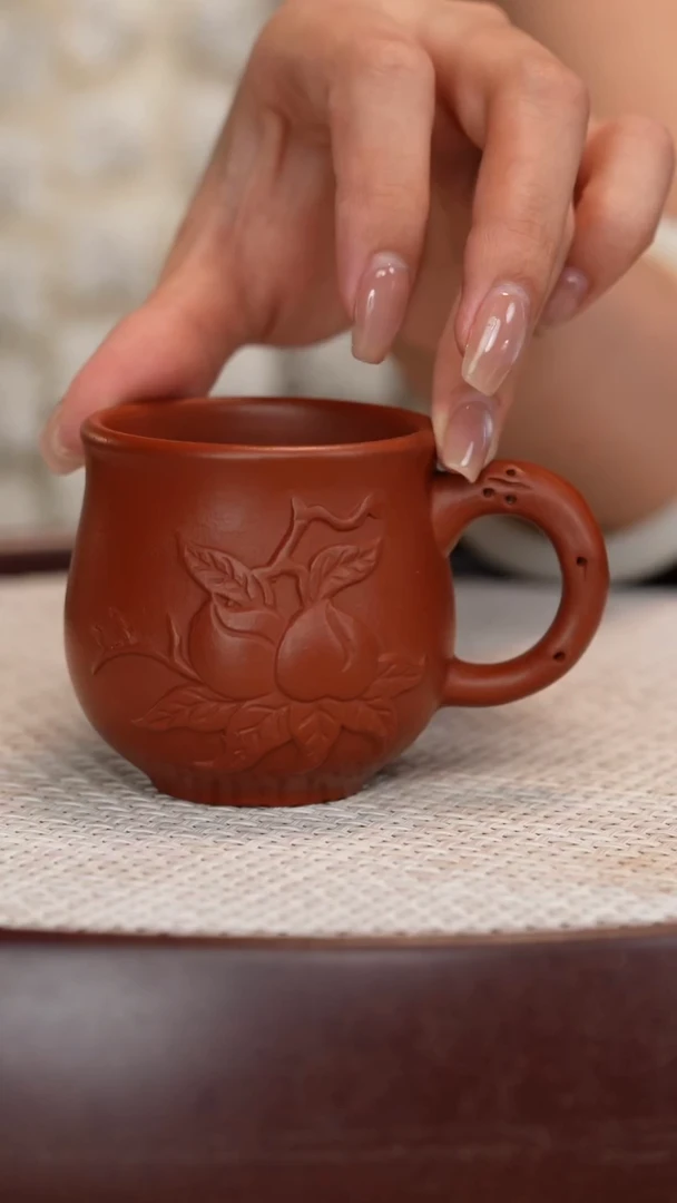 紫砂茶杯大红袍寿桃带把杯