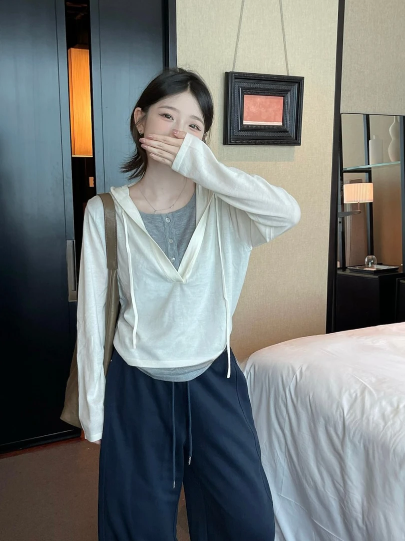 慵懒风连帽假两件长袖T恤女秋季2025新款宽松显瘦设计感针织上衣