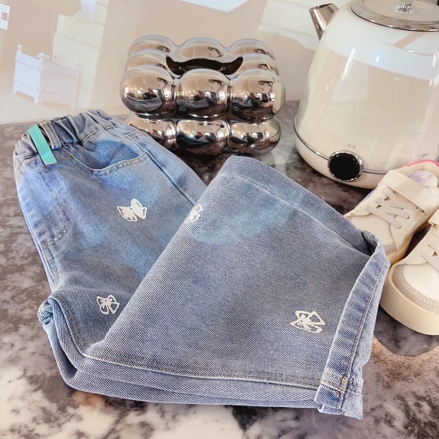 HHkids2025春新款儿童韩版设计感蝴蝶结印花休闲直筒牛仔裤DKZ332