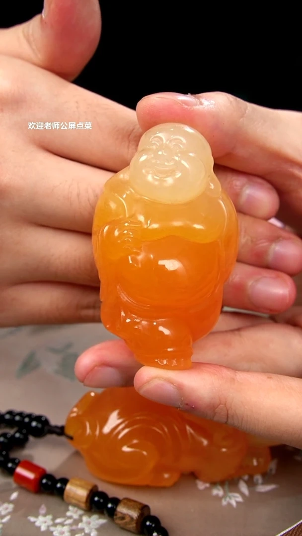 印尼石弥勒手把件