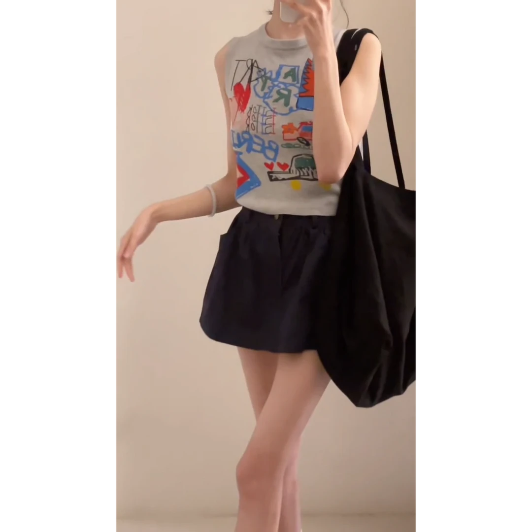 MARIE.COCO设计感涂鸦印花短款修身无袖上衣搭配高腰A字短裙套装