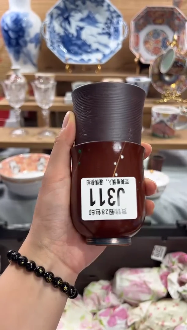瓷片她****亮      J311