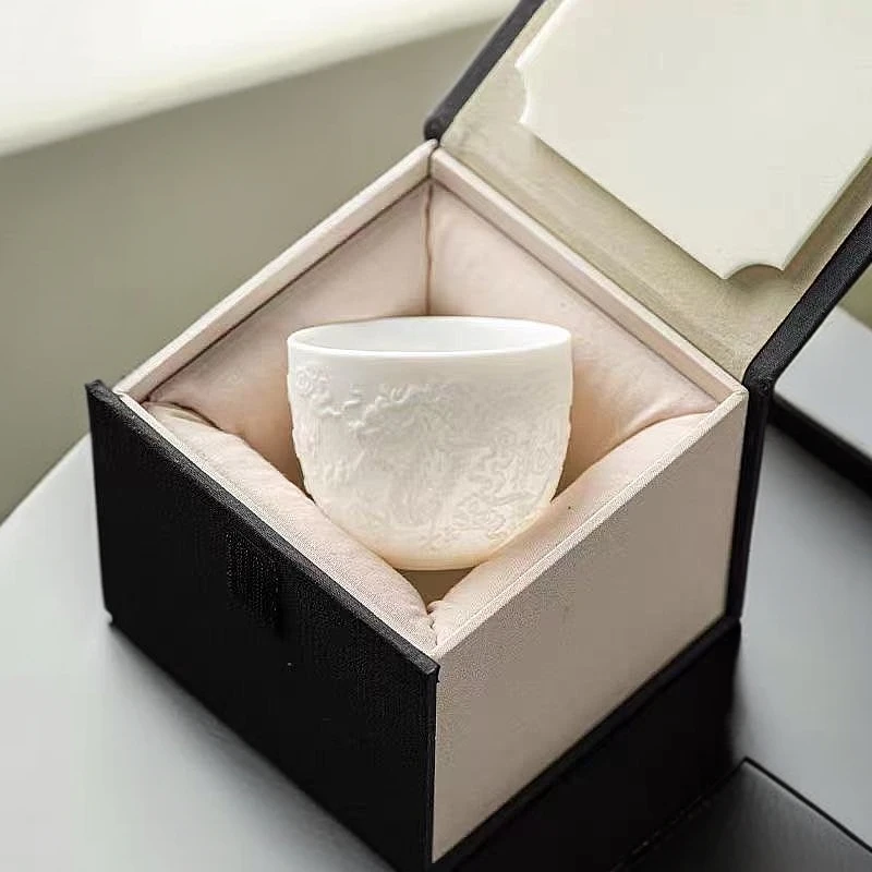 全网热销羊脂玉白瓷浮雕茶杯高档茶具主人杯适合家用的陶瓷品茗杯