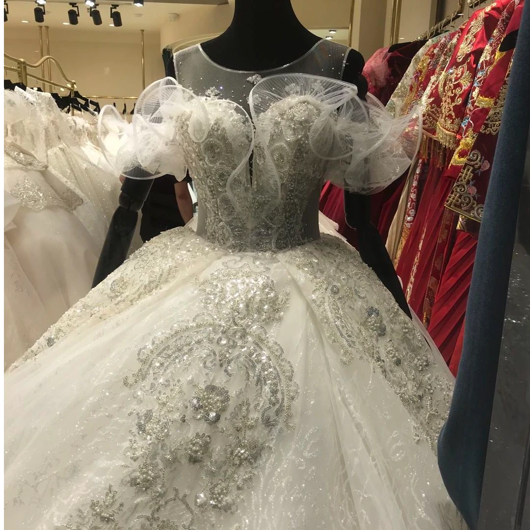 甜美挂肩海浪一字肩婚纱