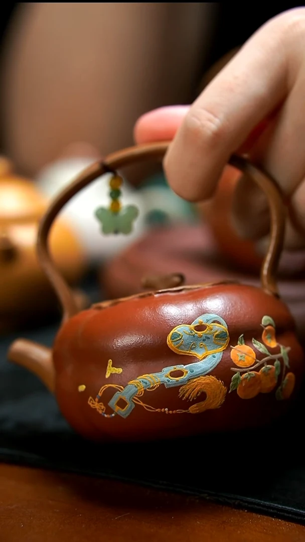 茶壶紫砂柿子如意提梁壶