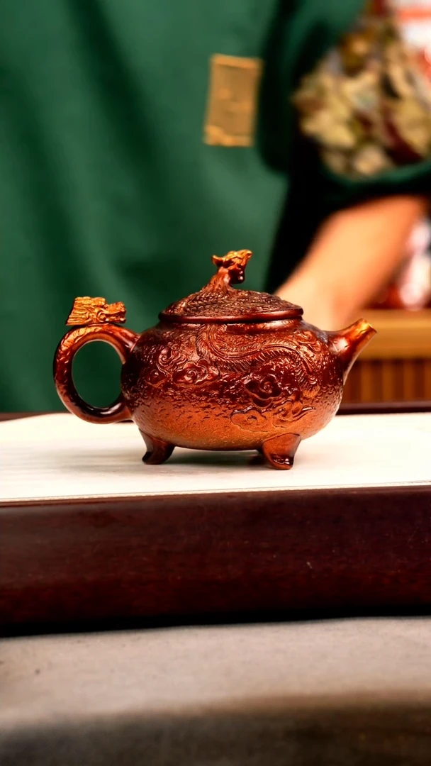 茶壶紫砂金贝烧 三足龙嘴 刻绘