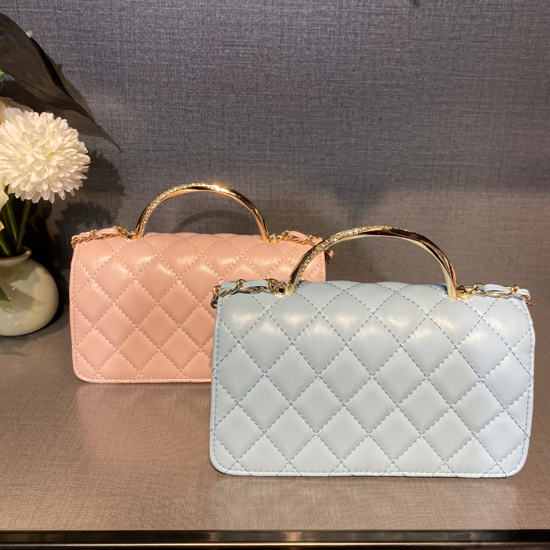 粉 蓝色小襄风手提斜挎包