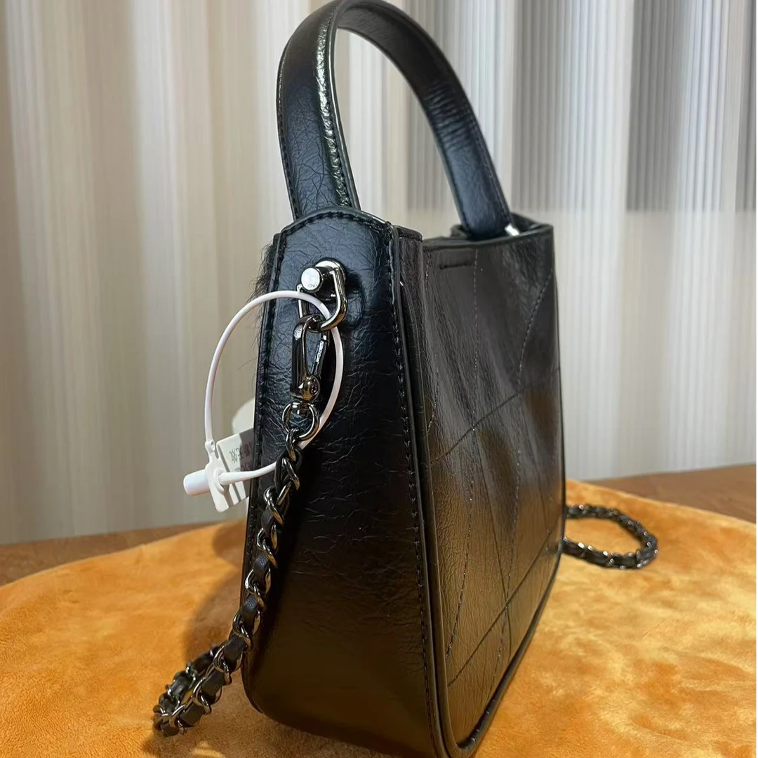 HIRMRIS手工真皮包550680-黑  银球毛阳