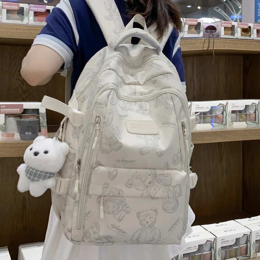 高颜值书包女初中生高中大学生大容量2025新款小学轻便双肩背包男