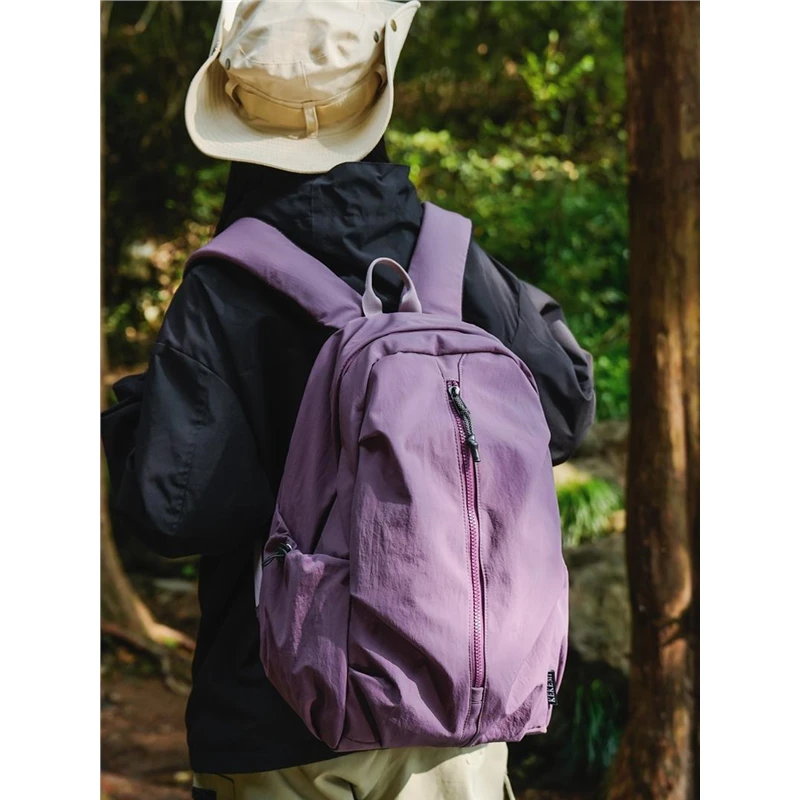 双肩包女士轻便休闲包书包初中女生高级感紫色户外登山包男生背包