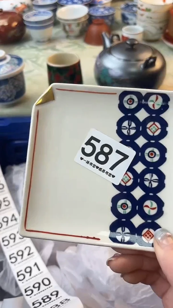 瓷片菩***?587
