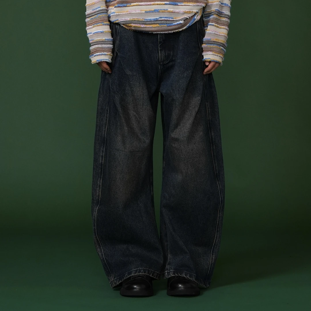 复古洗水 时尚弯刀裤型潮流牛仔裤 7802