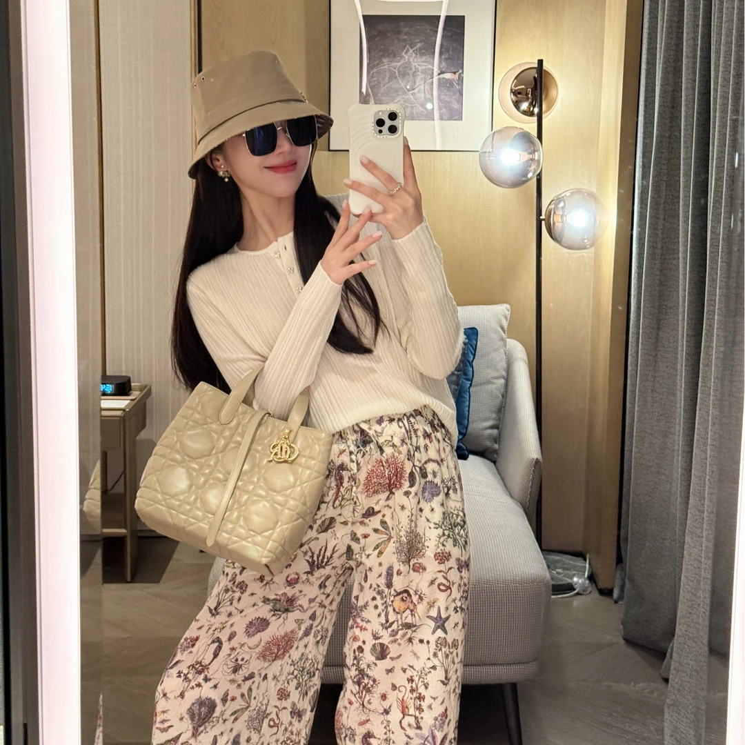 希娜 慵懒风修身显瘦长袖针织衫-三粒扣