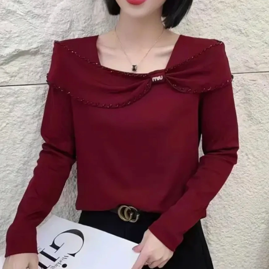 春季新款设计感打底衫气质百搭显瘦减龄套头蝴蝶结烫钻纯色上衣女