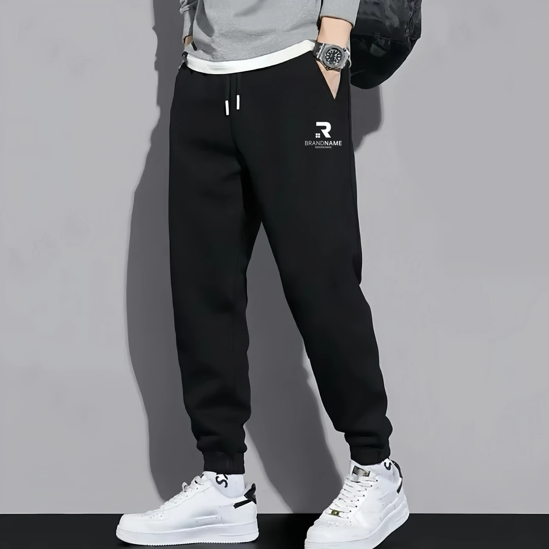 啄木鸟男士休闲运动卫裤时尚百搭潮流弹力修身休闲裤春秋男卫裤