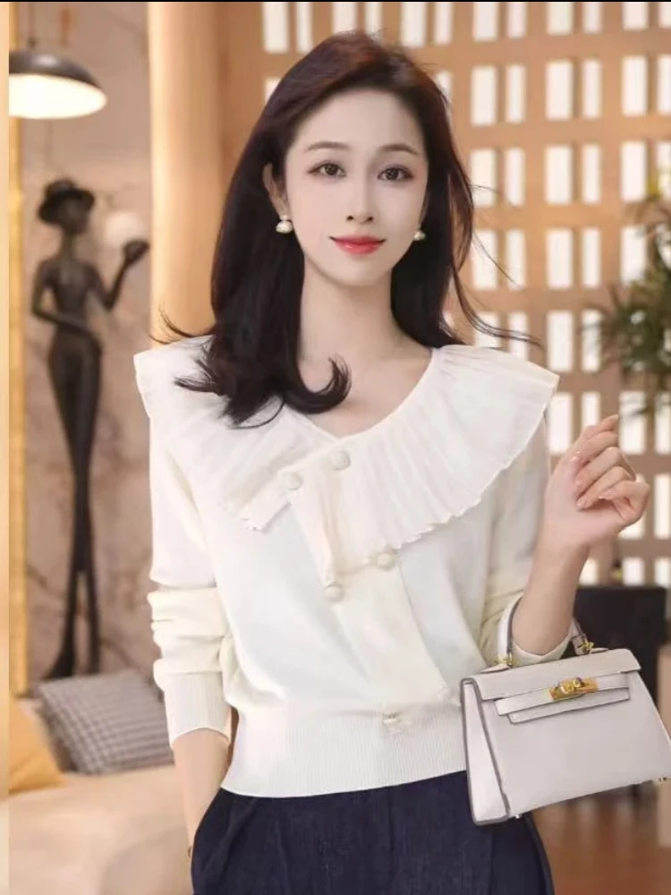 白色针织衫女2025新款秋巨好看设计感独特别致超好看气质高端上衣
