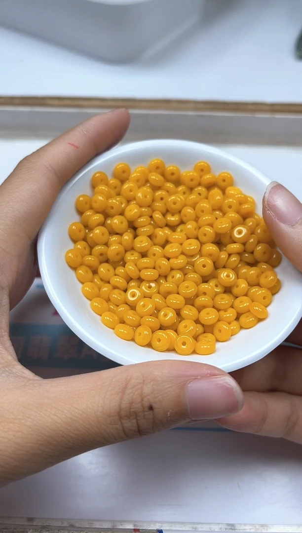 玛瑙/玉髓散珠未镶嵌M727鸡油黄算盘3*6mm50个9.9元