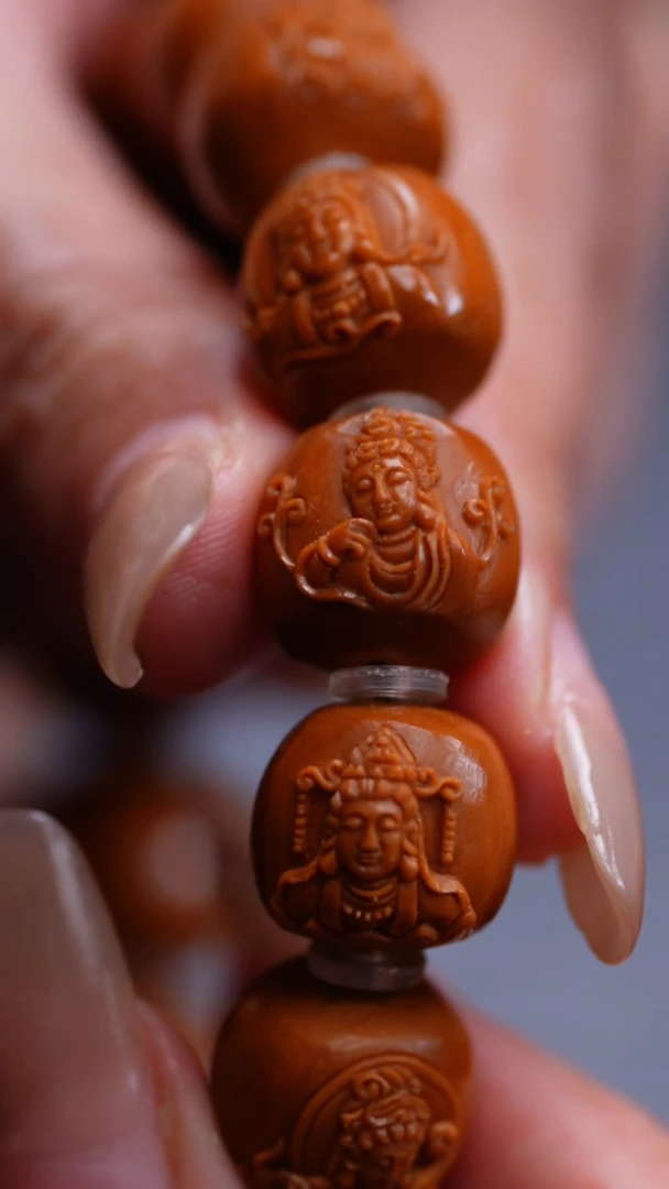 橄榄核吊坠哎****嘿橄榄核