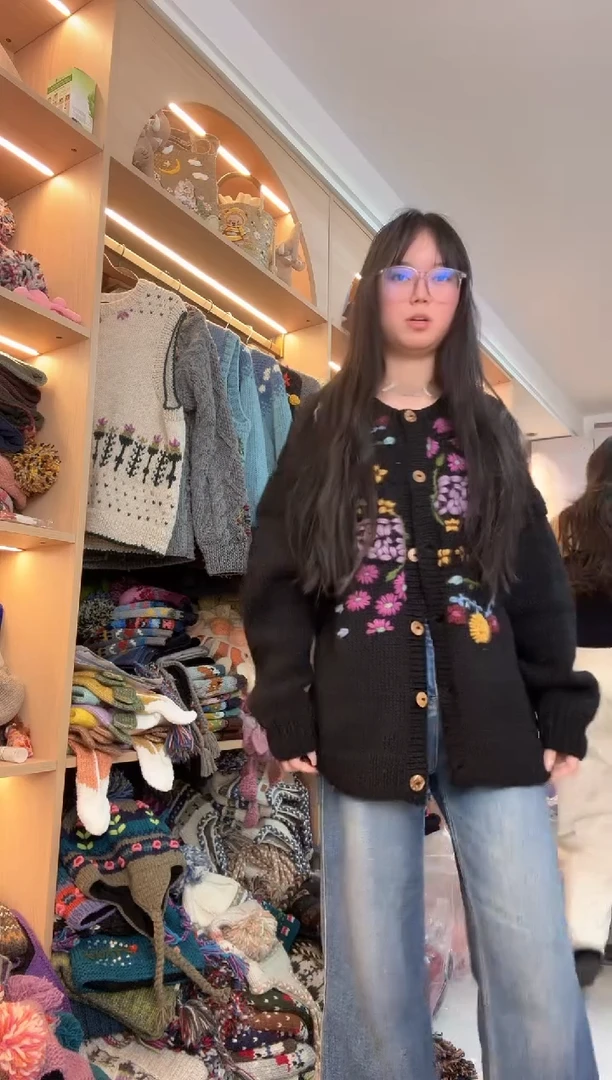 羊毛黑色长款开衫毛衣