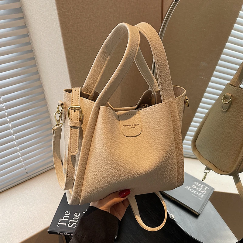 佐猫2025春夏新款包包手提单肩包时尚百搭水桶包小众高级感斜挎包