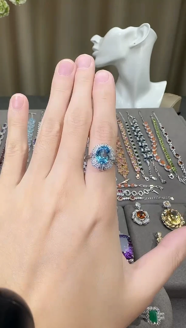 银S925镶嵌戒指托帕石10*8mm戒指妖姬蓝