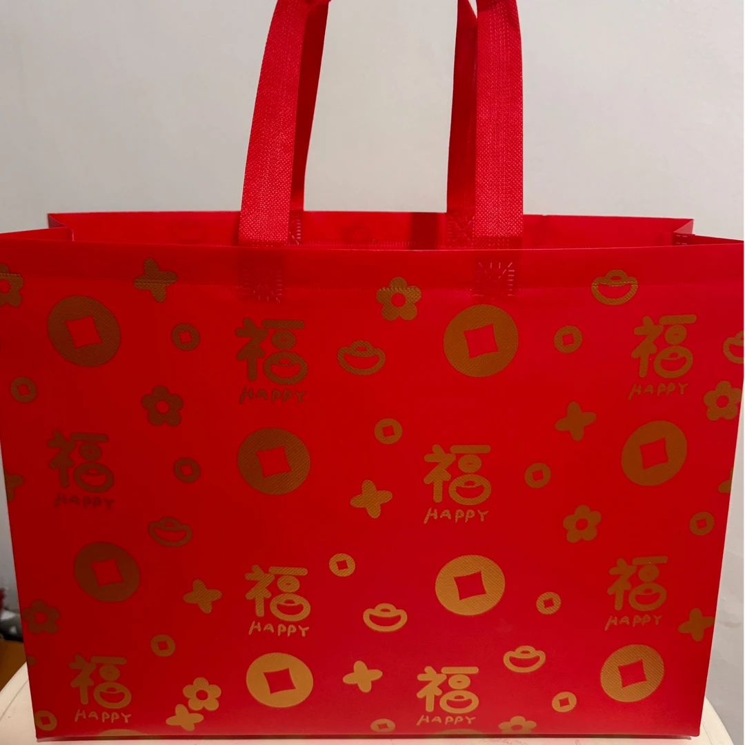 礼品时尚覆膜无纺布喜乐礼品袋手提袋男女装店定制
