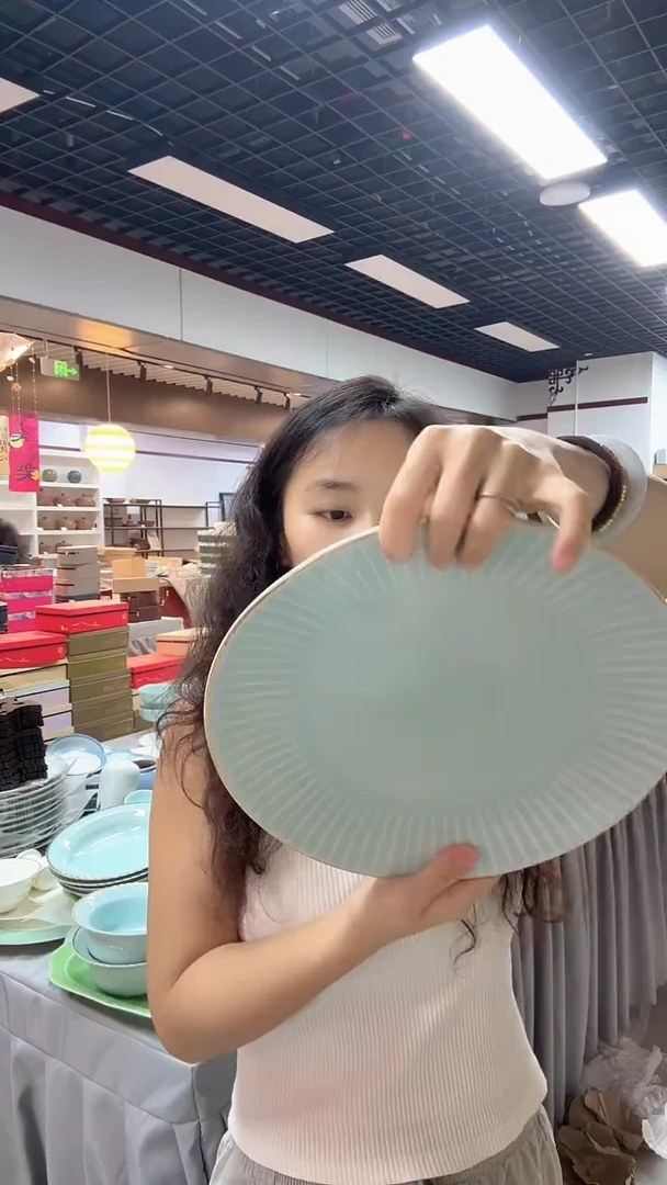 瓷片一个多宝鱼的影青高级盘子