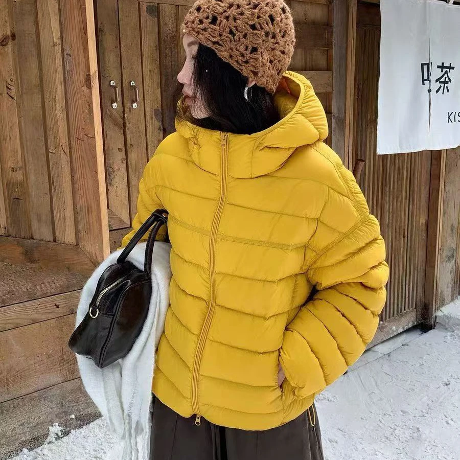 90白鸭绒2025冬季新款韩版连帽排骨羽绒服女短款宽松洋气百搭外套