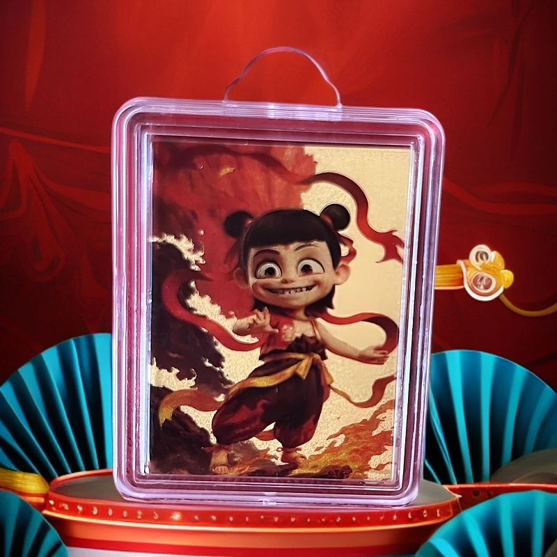 《中国黄金拍2送1小》哪吒手机挂件999含金2025年新款爆款手机贴999