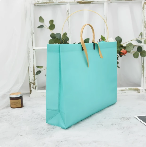 覆膜无纺布手提袋服装店叉耳袋高端女装购物袋衣服包装袋定制LOGO