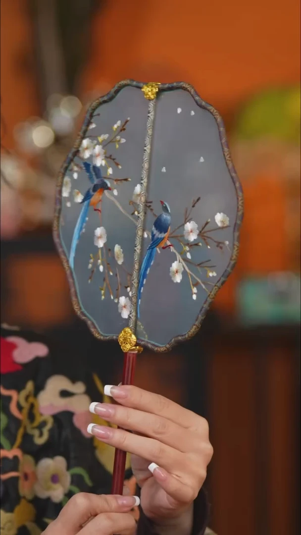 豆包的星耀家非遗团扇