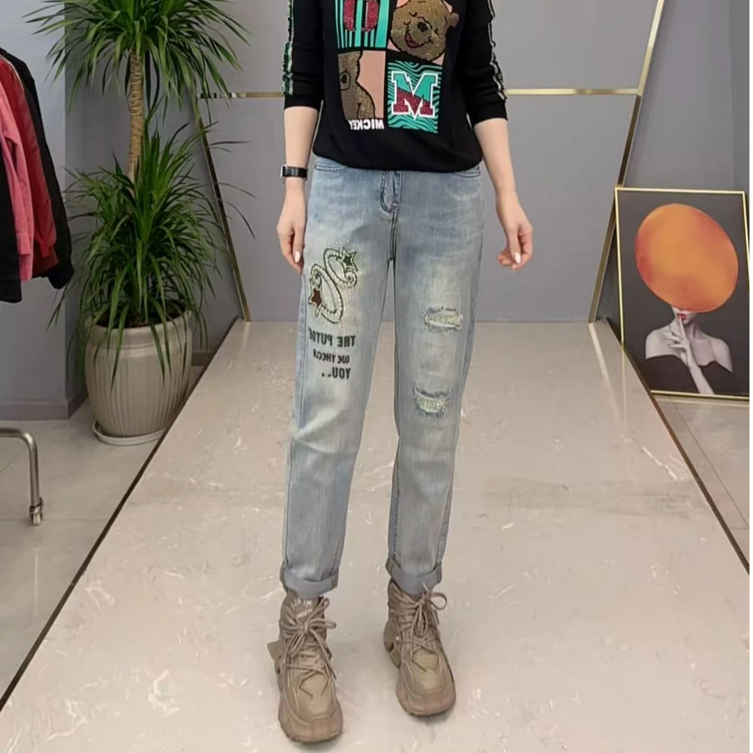 shishu/拾束2025春季时尚潮流烫钻英文浅色重工女牛仔裤SMY86036