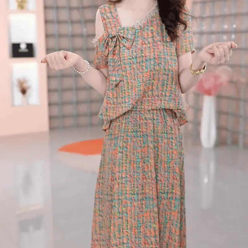 027【上衣+半身裙】2025夏季新款时尚气质露肩蝴蝶结收腰显瘦套装