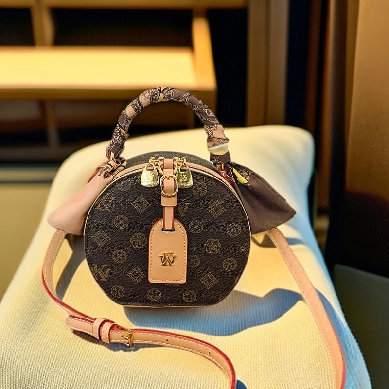 时尚竖式单肩百搭复古手提包小圆包斜挎包圆形苹果包零钱包新款潮