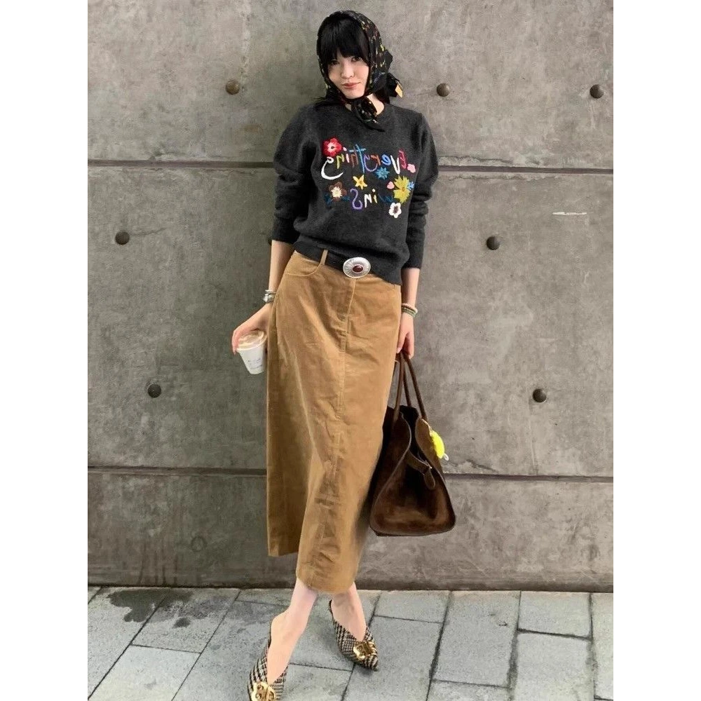 初冬森系穿搭一整套高级感小香风黑色卡通针织衫半身裙休闲套装女