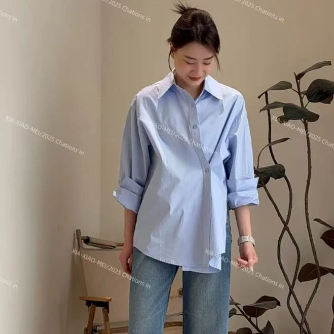 不规则斜扣开叉衬衫女早春新款韩版简约气质长袖设计感小众上衣