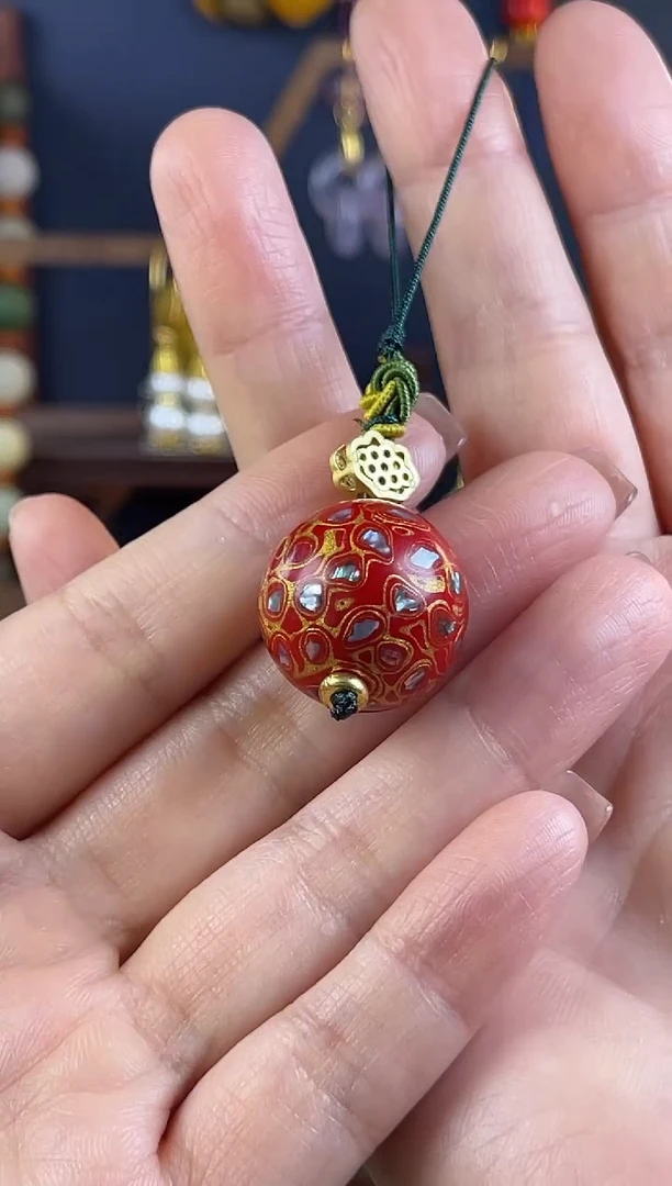 艳**北红金色大漆手机链珠子
