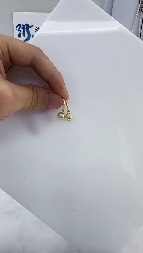 银S925镶嵌海水珍珠DA羽皇金耳钩7-8 a211