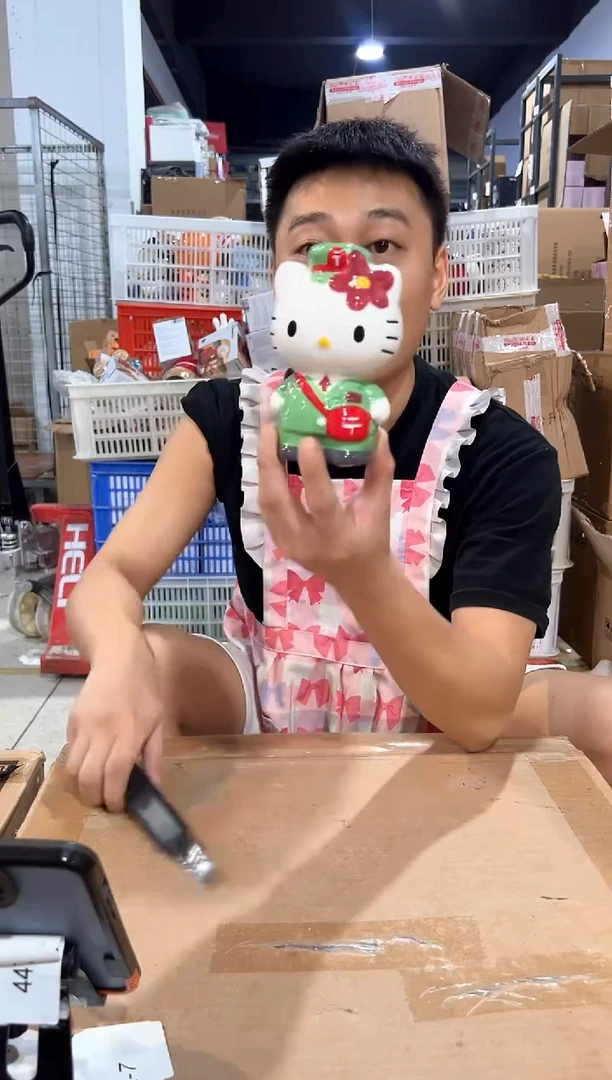瓷片绿色kt猫邮递员存钱罐