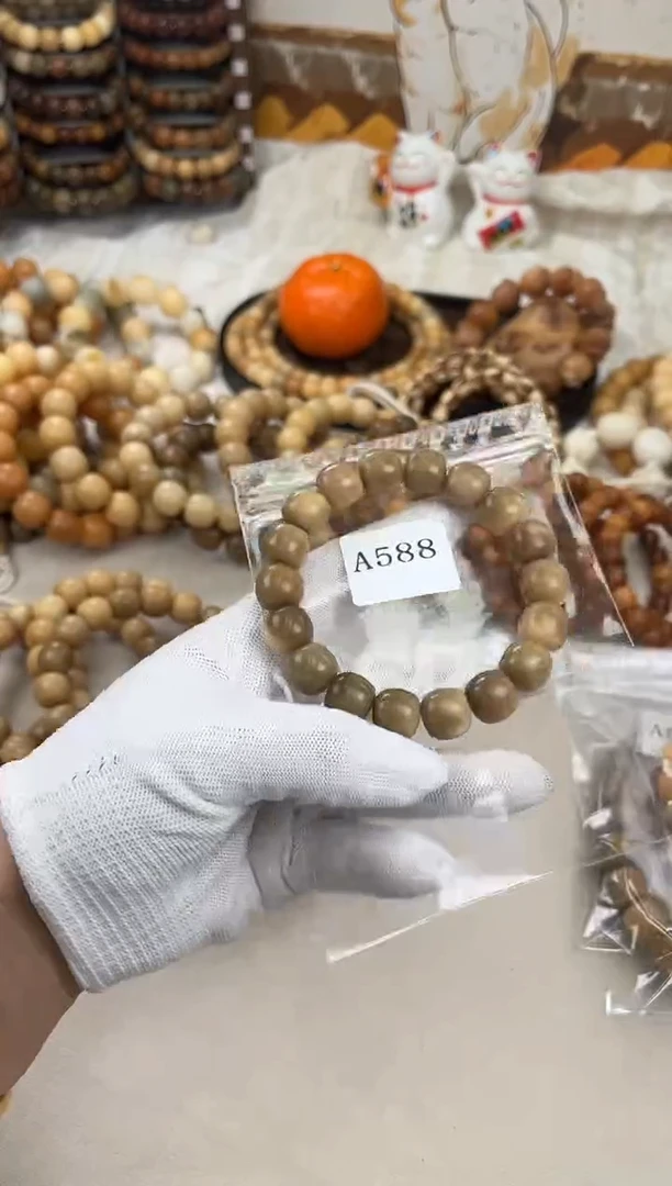 菩提根/象牙果手串a588卡14 干磨花海