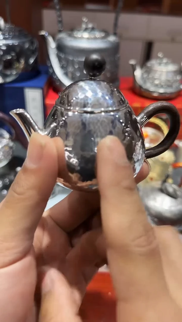 足银999精工手工锤纹亮面龙蛋泡茶壶