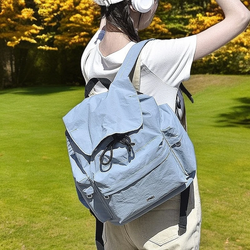 新款时尚百搭双肩包文艺休闲便携包盖式轻奢森系多袋设计